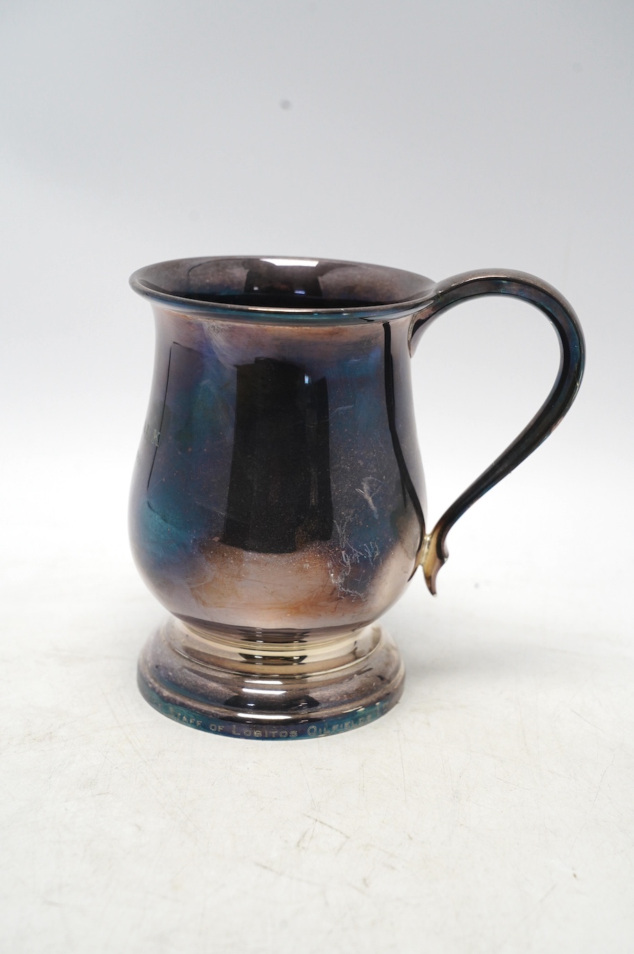 A George V silver baluster mug, with later engraved inscription, Joseph Gloster Ltd, Birmingham, 1934, height 13.8cm, 10.9oz. Condition - fair